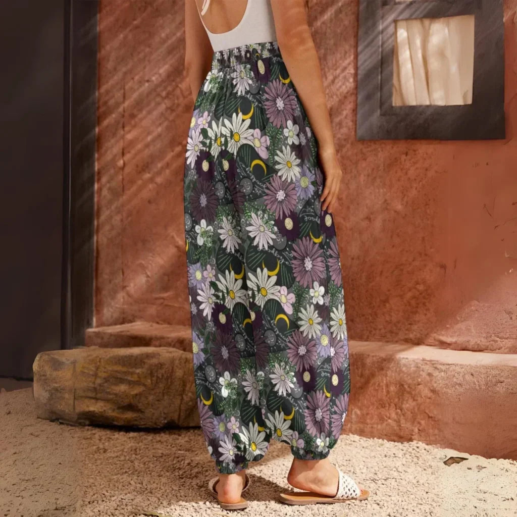 Floral print harem pants with an elastic ankle cuff, back view - BOHEMIAN FLOWER PLANCHETTE HAREM PANTS WOMEN