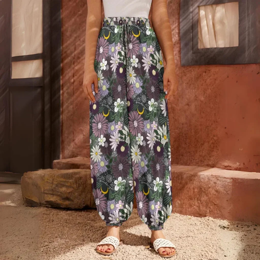 Floral print harem pants with an elastic ankle cuff, front view - BOHEMIAN FLOWER PLANCHETTE HAREM PANTS WOMEN