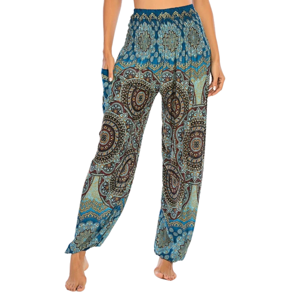 Bohemian-style harem pants with paisley patterns in different colors paired with black crop tops - BOHEMIAN INSPIRED WIDE LEG ALADDIN PANTS FOR LADIES - Sky blue