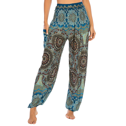 Bohemian-style harem pants with paisley patterns in different colors paired with black crop tops - BOHEMIAN INSPIRED WIDE LEG ALADDIN PANTS FOR LADIES - Sky blue