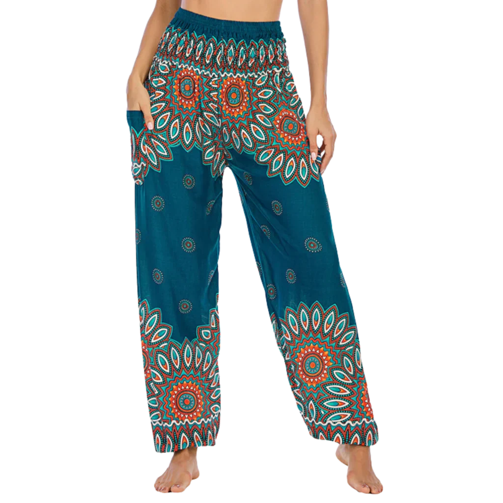 Colorful bohemian-style harem pants with peacock feather and geometric patterns, teal colored, front view - BOHO SMOCKED ALADDIN PANTS FOR LADIES