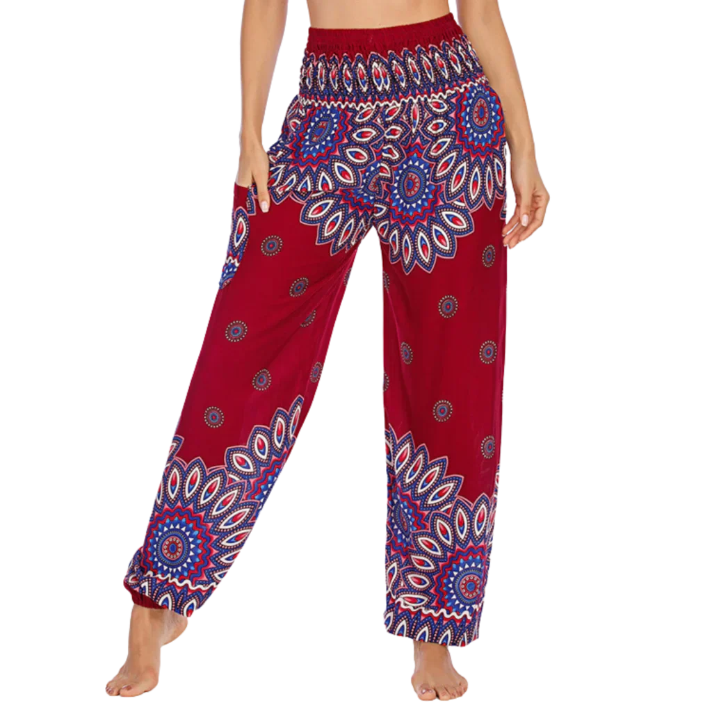 Colorful bohemian-style harem pants with peacock feather and geometric patterns, red colored, front view - BOHO SMOCKED ALADDIN PANTS FOR LADIES