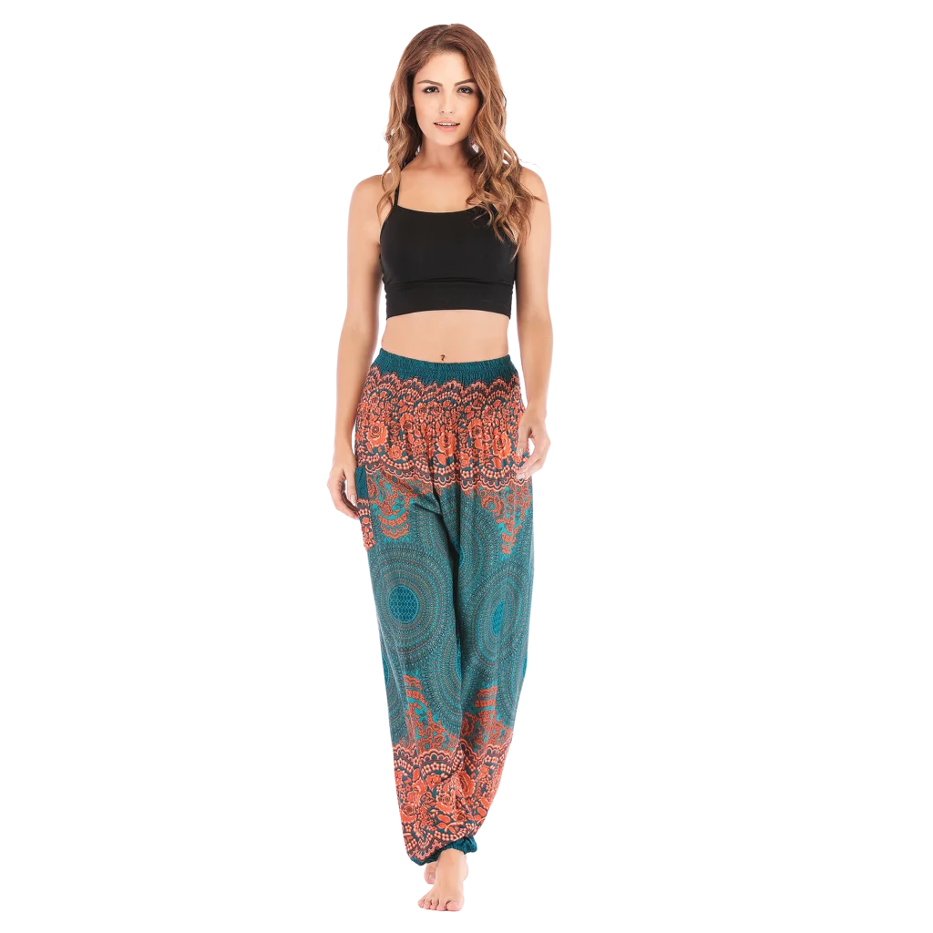 Patterned harem pants with a mandala print in Green, Brown and gray paired with a black crop top, front view - ETHNIC PRINT SMOCKED ALADDIN PANTS FOR LADIES