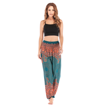 Patterned harem pants with a mandala print in Green, Brown and gray paired with a black crop top, front view - ETHNIC PRINT SMOCKED ALADDIN PANTS FOR LADIES