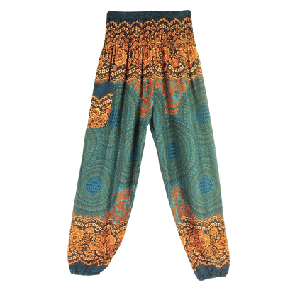 Patterned harem pants with a mandala print in Blue, yellow and green paired with a black crop top, front view - ETHNIC PRINT SMOCKED ALADDIN PANTS FOR LADIES