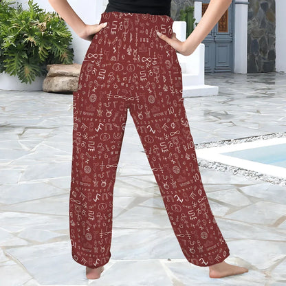 Burgundy-colored loose pants with white doodle-style pattern print, back view - MYSTIC NUMBERS HIGH-WAISTED ALADDIN PANTS FOR LADIES