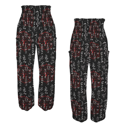 Flowy black harem pants with red and white geometric tribal print pattern, front-back view - MYSTIC RED ALCHEMY ALADDIN PANTS FOR LADIES