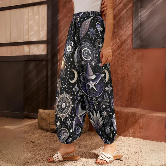 Loose-fitting harem pants with celestial moon and star patterns in black and white, side view - MYSTICAL CELESTIAL TAROT HAREM PANTS WOMEN