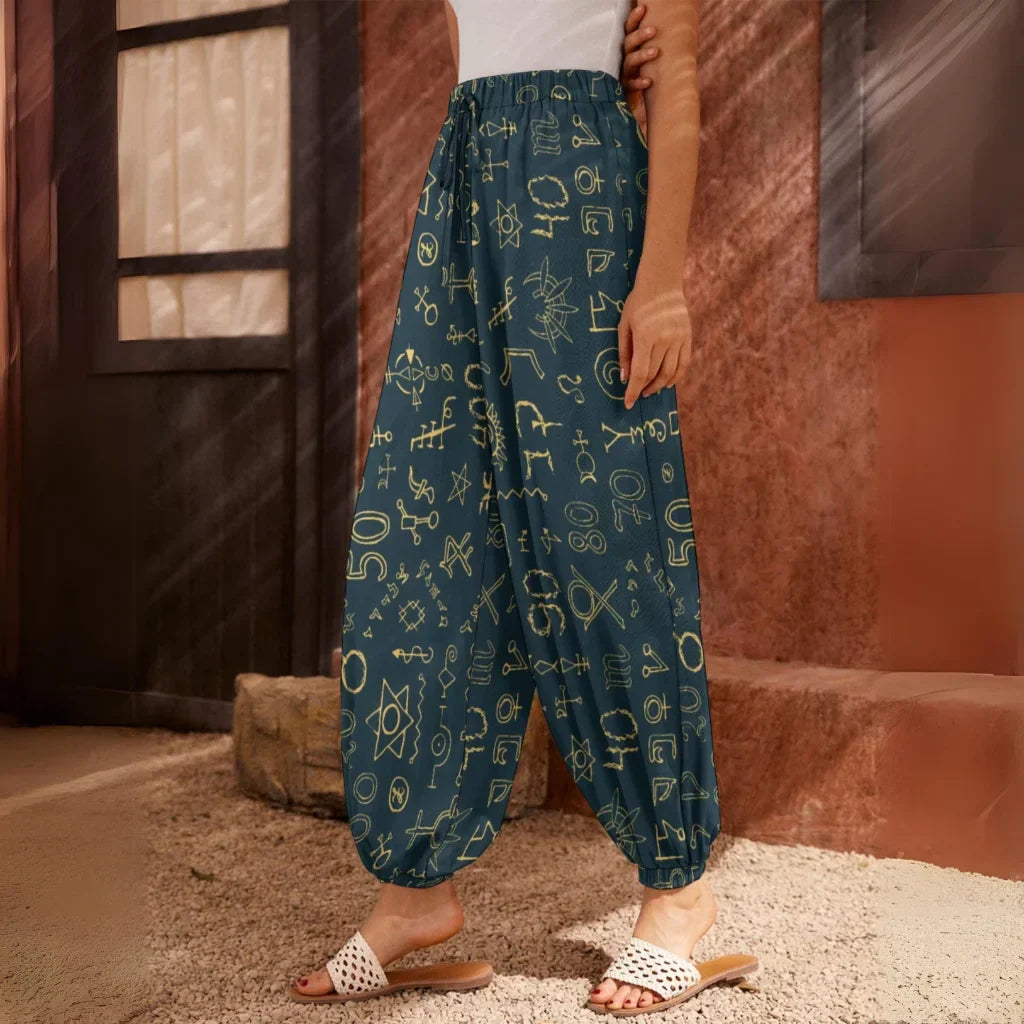 Teal harem pants with golden geometric sacred symbols print pattern, side view - MYSTICAL HAREM PANTS WOMEN WITH SACRED SYMBOLS