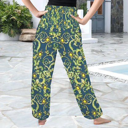 Flowy harem pants with green and yellow baroque-style floral print pattern, back view - OCCULT FLORAL HIGH-WAISTED ALADDIN PANTS FOR LADIES