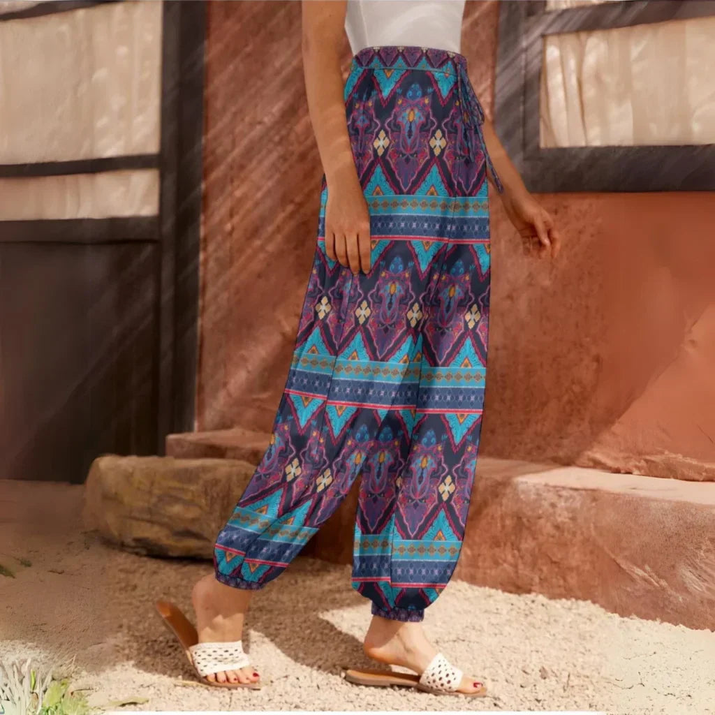 Colorful harem pants with blue and purple geometric patterns, side view - PAISLEY MEDALLION HAREM PANTS WOMEN - BOHO YOGA STYLE