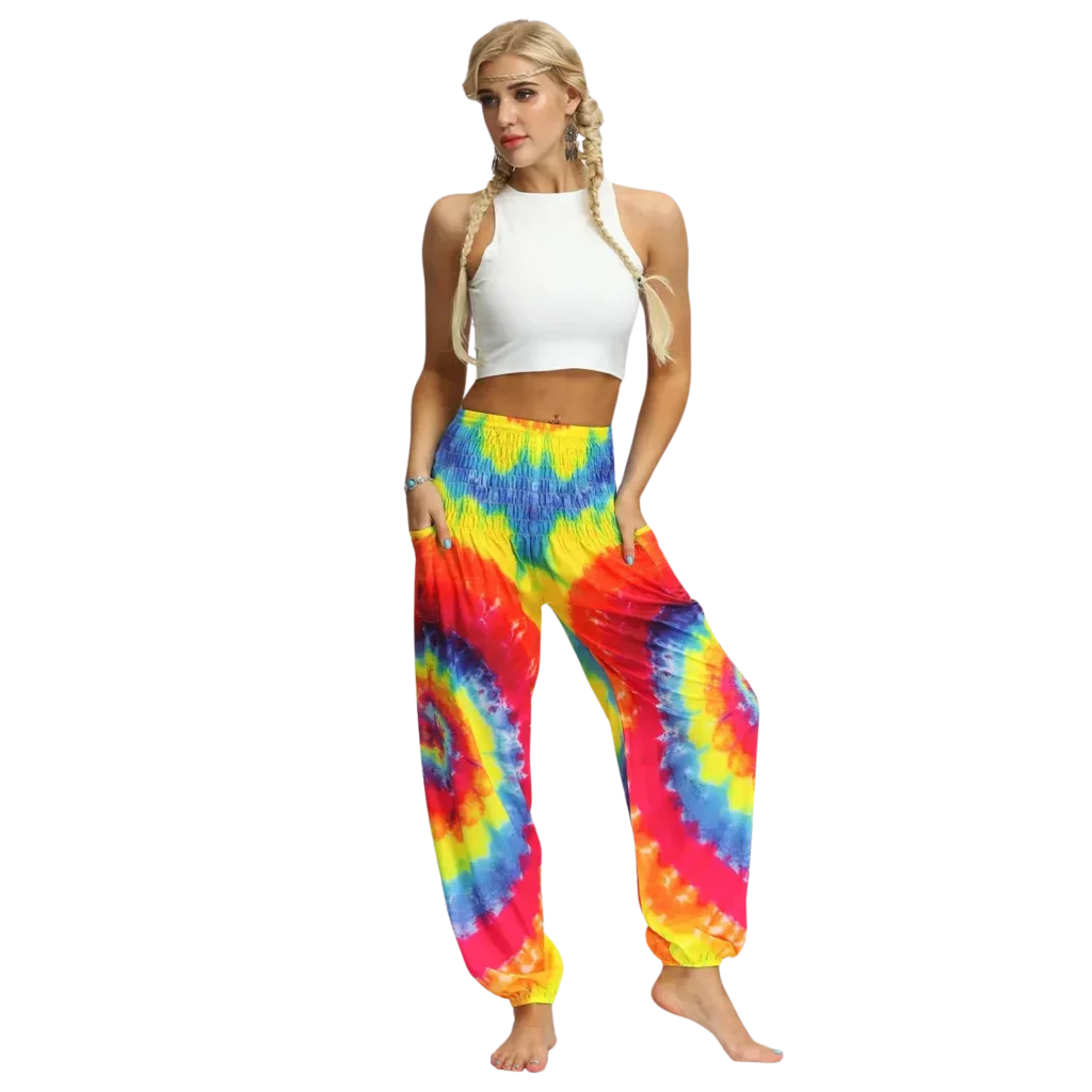 Vibrant tie-dye harem pants with elastic cuffs paired with a white crop top, front view - TIE DYE SMOCKED ALADDIN PANTS FOR LADIES FOR YOGA & FESTIVALS - Style A / Average Size