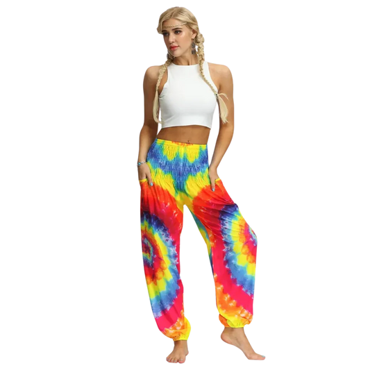 Vibrant tie-dye harem pants with elastic cuffs paired with a white crop top, front view - TIE DYE SMOCKED ALADDIN PANTS FOR LADIES FOR YOGA & FESTIVALS - Style A / Average Size