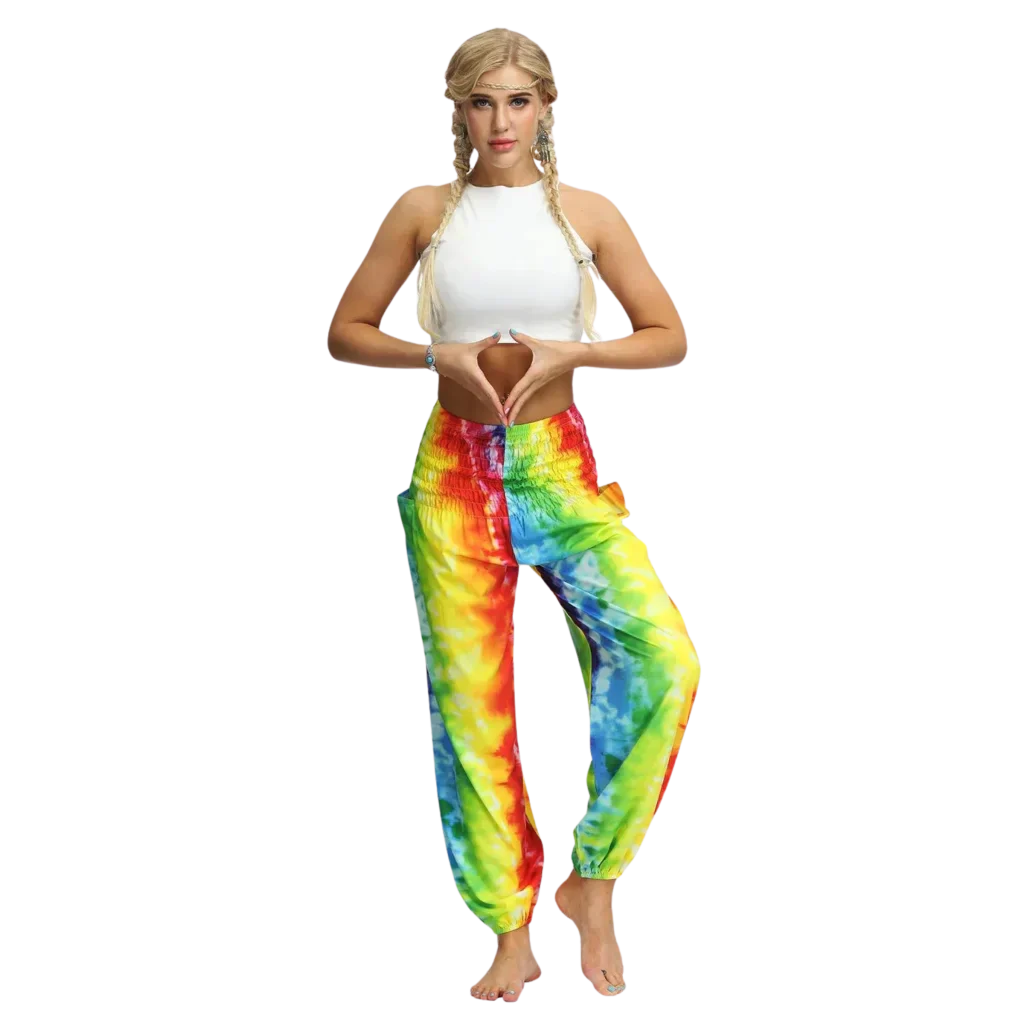 Vibrant tie-dye yellow-red harem pants with elastic cuffs paired with a white crop top, front view - TIE DYE SMOCKED ALADDIN PANTS FOR LADIES FOR YOGA & FESTIVALS - Style A / Average Size