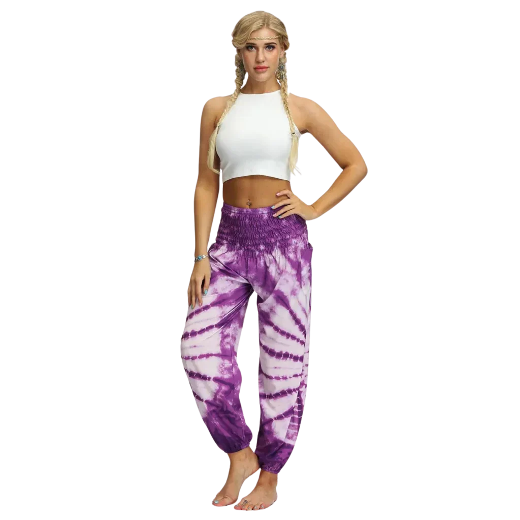 Vibrant tie-dye purple-white harem pants with elastic cuffs paired with a white crop top, front view - TIE DYE SMOCKED ALADDIN PANTS FOR LADIES FOR YOGA & FESTIVALS - Style A / Average Size