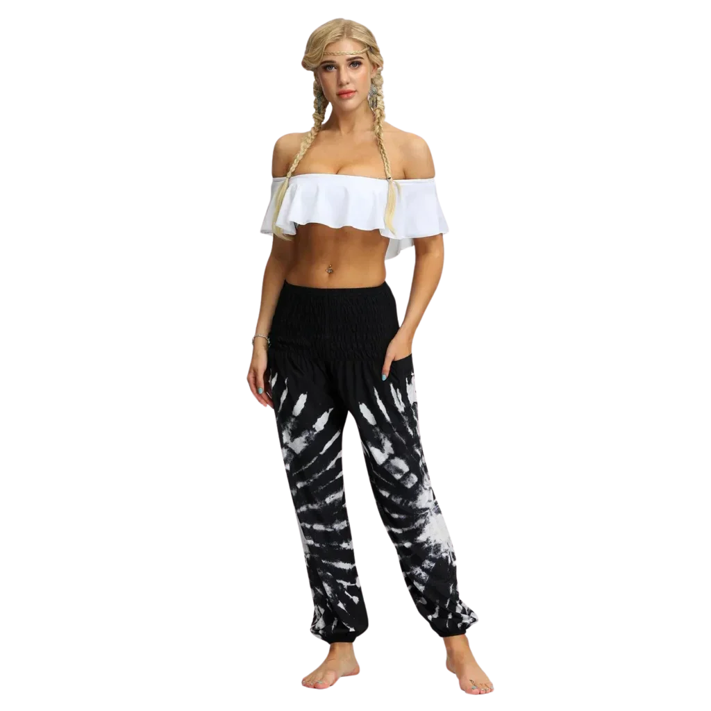 Vibrant tie-dye black-white harem pants with elastic cuffs paired with a white crop top, front view - TIE DYE SMOCKED ALADDIN PANTS FOR LADIES FOR YOGA & FESTIVALS - Style A / Average Size