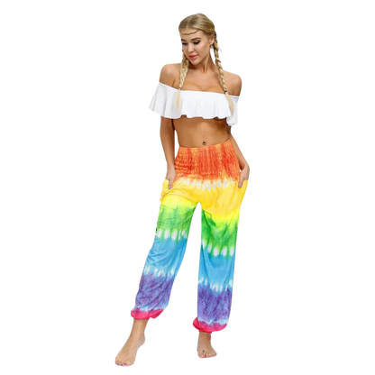 Vibrant tie-dye yellow-red harem pants with elastic cuffs paired with a white crop top, front view - TIE DYE SMOCKED ALADDIN PANTS FOR LADIES FOR YOGA & FESTIVALS - Style A / Average Size